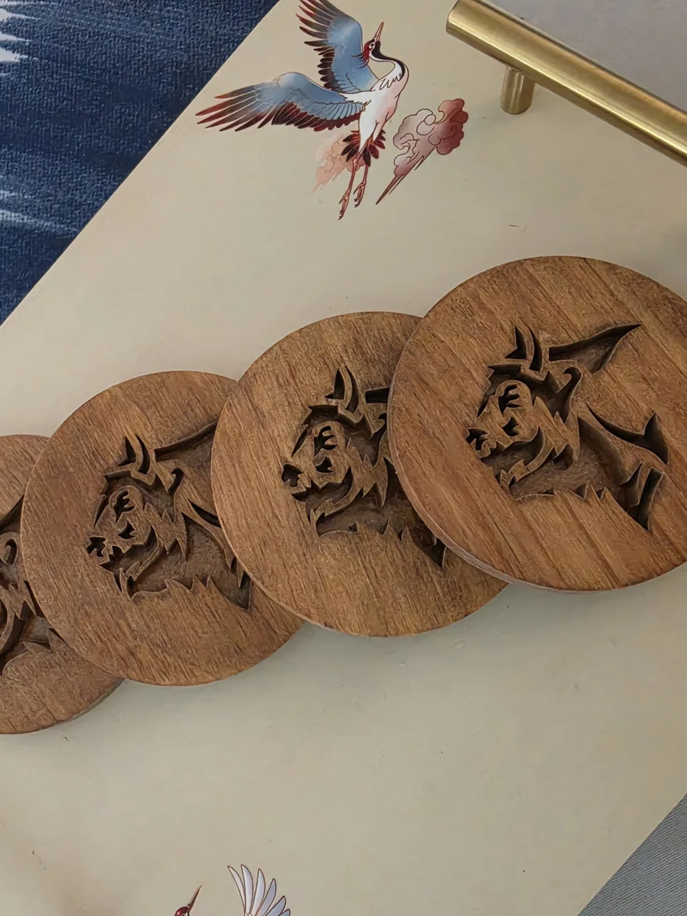 Custom carved wooden drink coaster featuring stylized Buffalo Bison silhouette